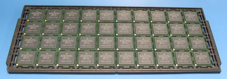 Electronic components on a tray with correct orrientation.