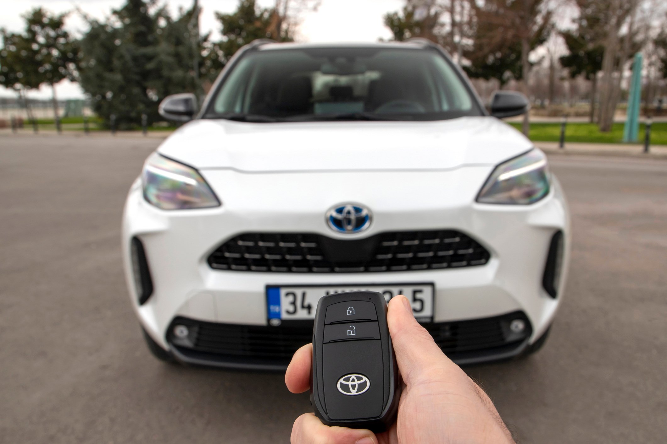 Toyota vehicle being unlocked with a key.